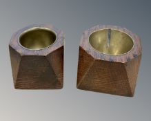 A pair of oak ash trays lined in brass formed from WWI bullet casings.