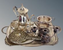A silver-plated twin-handled tray together with a further serving tray,