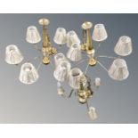 A pair of contemporary brass six way light fittings, with shades,