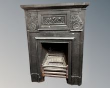 A 19th century cast iron fire insert, height 112 cm, width 83 cm.