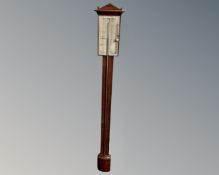 An antique continental stick barometer by Julius Nissen.