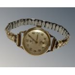 A 9ct yellow gold lady's wristwatch by Cyma, on expansion bracelet.