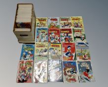 A box containing 20th century and later Walt Disney comics including Uncle Scrooge, Mickey Mouse,