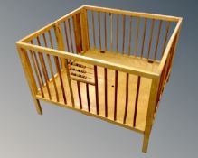 A mid-20th century folding play-pen/cot.