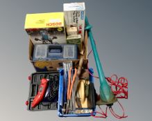 A box containing Bosch router and electric strimmer, tile cutter, toolbox,