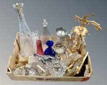 A box containing assorted glassware including cranberry glass vase, oversize cut glass decanter,
