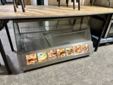 A Roller Grill stainless steel commercial counter top food warming cabinet.