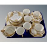 A tray of twenty one pieces of Grafton tea china