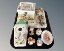 A tray containing Beatrix Potter including Beswick and World of Beatrix Potter figures, books,