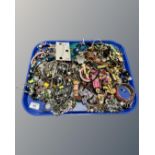 A tray of costume jewellery, bangles,