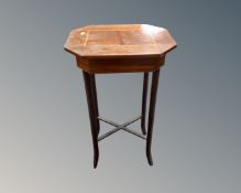 A 19th century inlaid mahogany occasional table.