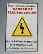 A cast iron railway electrocution warning wall plaque.