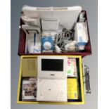 Two crates containing CDs, a portable DVD player, Nintendo Wii with leads, controller,