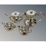 A silver plated four piece tea service by Walker & Hall.