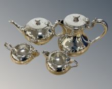 A silver plated four piece tea service by Walker & Hall.