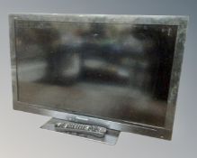 A Panasonic 32 inch LCD TV with remote