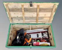Two painted pine tool boxes containing G-clamps, welding masks,