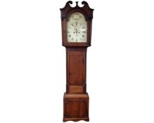 A 19th century oak longcase clock with painted dial, pendulum,