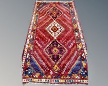 An antique Caucasian carpet 290 cm x 150 cm