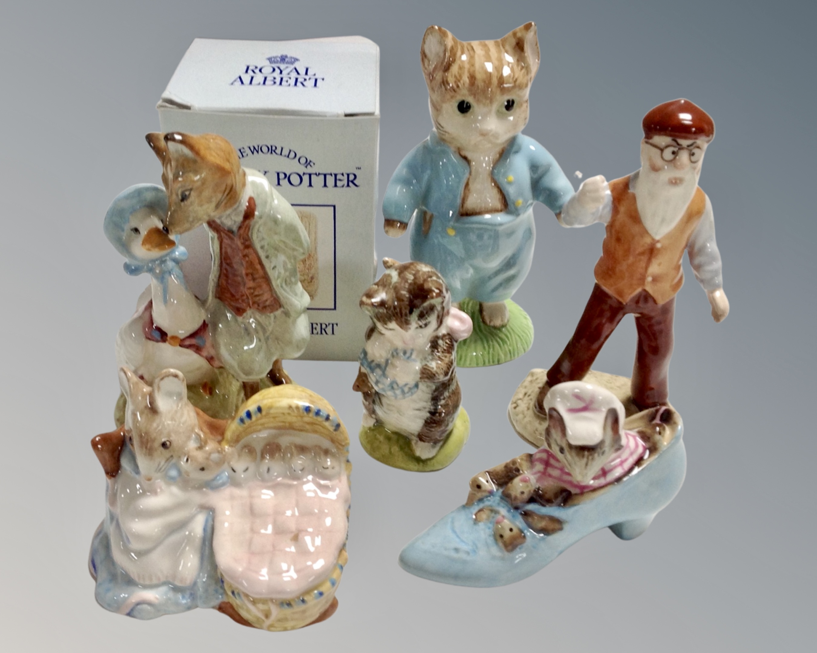 Six assorted Royal Albert Beatrix Potter figures to include Tom Kitten, Mr McGregor, Miss Moppet,