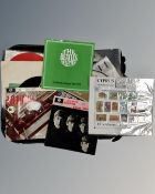 A Cyprus Stamp souvenir, together with a collection of 45rpm records including The Beatles,
