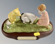 A Royal Doulton Whinnie the Pooh Collection figure, Eeyore loses a tail,