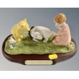 A Royal Doulton Whinnie the Pooh Collection figure, Eeyore loses a tail,