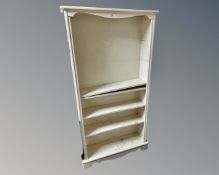 A set of painted pine open shelves