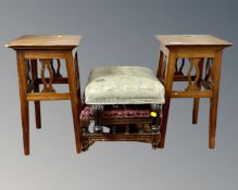 A pair of Edwardian mahogany plant stands and two further footstools