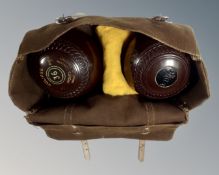 A pair of Jacques of London lawn bowls, size 36, in canvas bag.