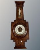An oak Arts & Crafts barometer