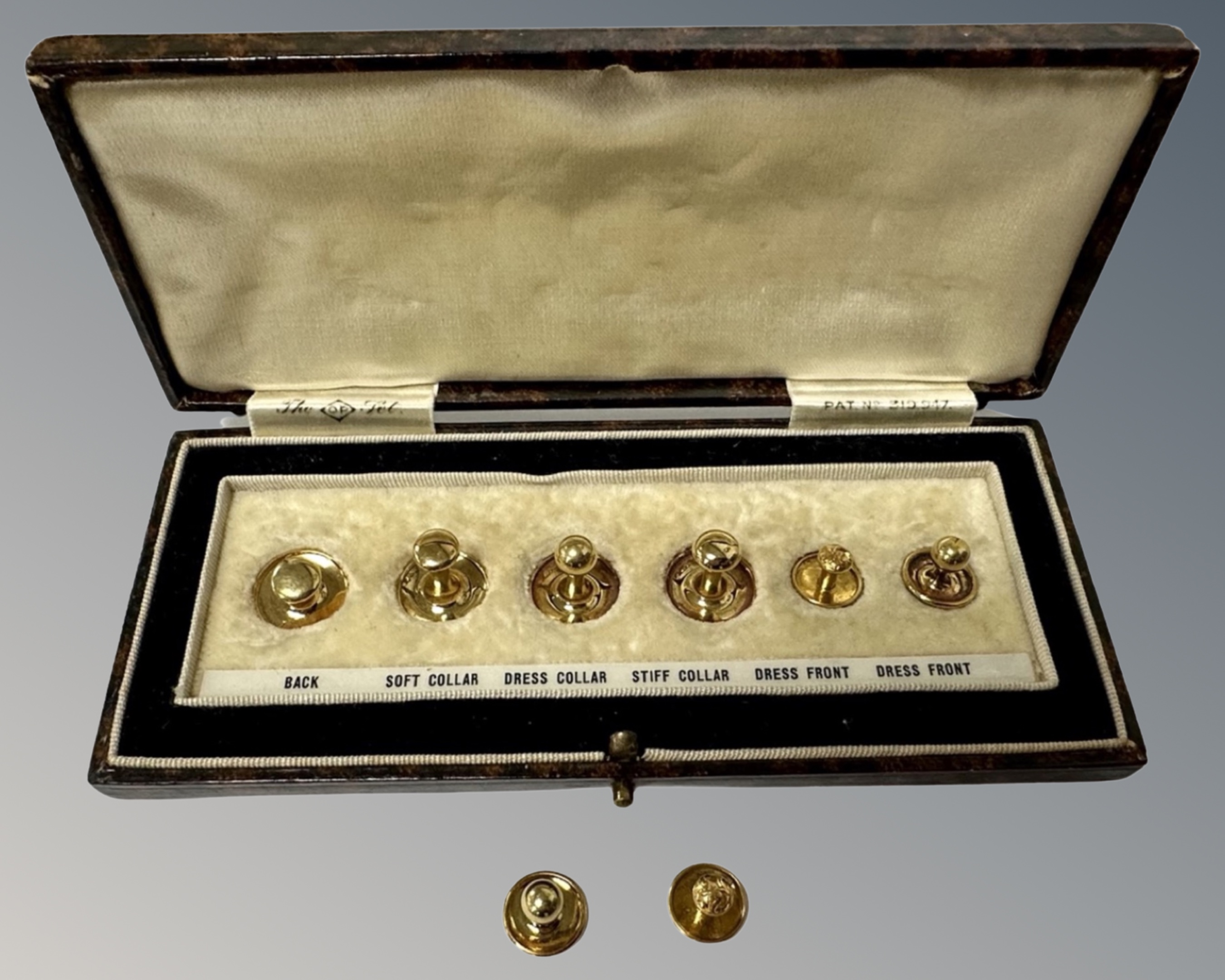 A set of six 18ct yellow gold dress studs, together with two further 18ct yellow gold studs.