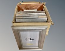 One crate containing eighteen photo frames, different sizes and styles,