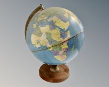 A Philips 12" Political challenge globe on stand