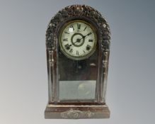 An early 20th century Japanese domed topped mantel clock