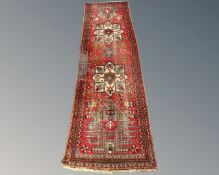 A Caucasian Kazak runner, 85cm by 275cm.