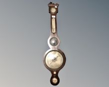 A George III barometer with silvered dial.