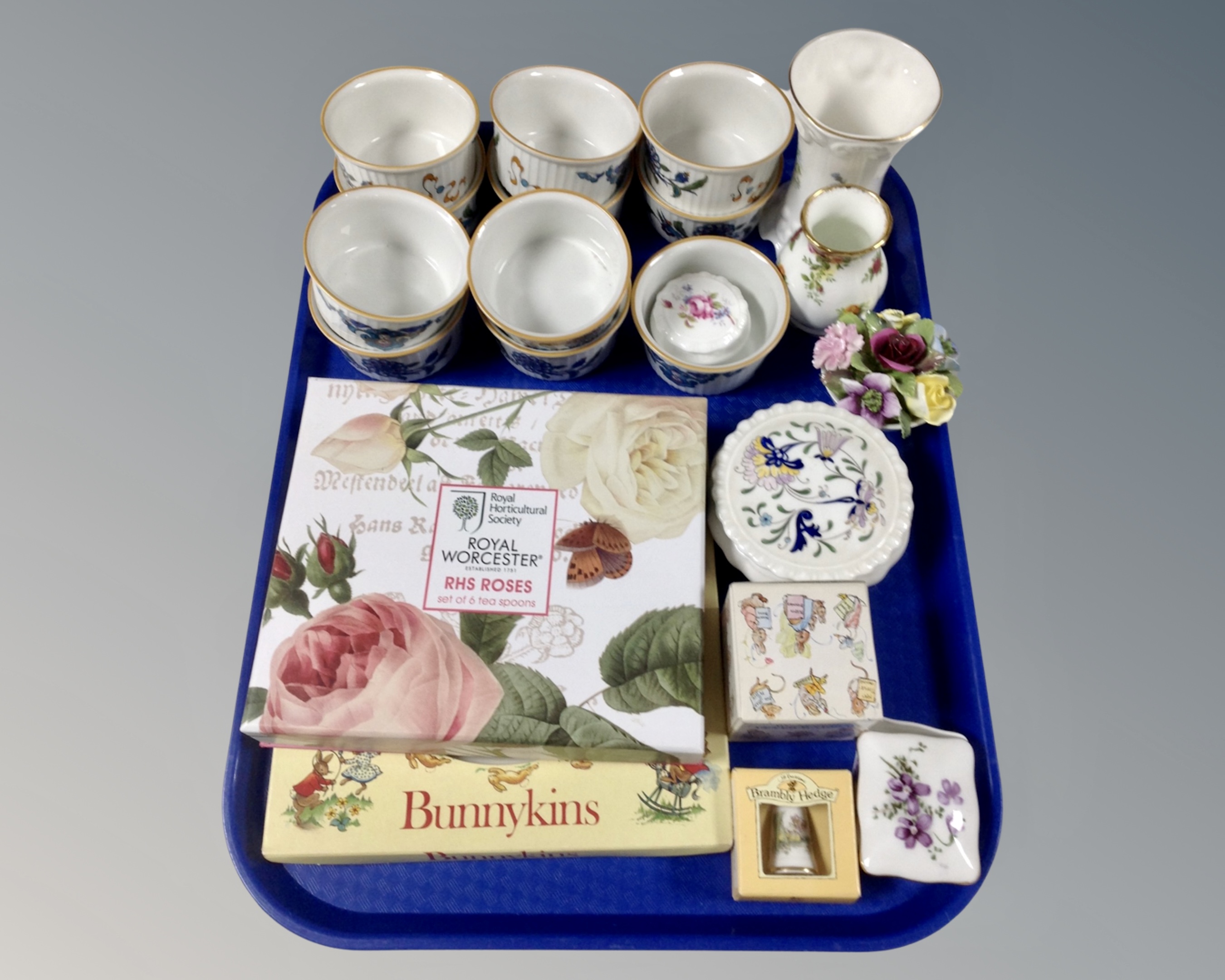 A tray of Royal Worcester ramekins and Royal horticultural society tea spoons, Bunnykins plate,