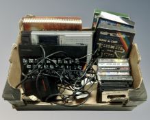 A Sinclair ZX Spectrum with leads and games and a Dixons cassette recorder