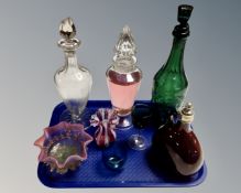 A tray of antique and later glass ware : decanters, over sized scent bottles,