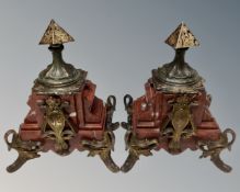 A pair of Art Nouveau metal and red marble garniture stands