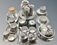 An extensive Portmeirion tea and dinner service, matching napkins and place mats,