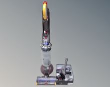 A Dyson ball animal II extra upright vacuum together with accessories