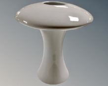 A contemporary white glass mushroom vase