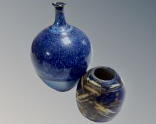 Two continental glazed pottery vases, signed.
