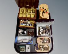 A tray of assorted jewellery boxes, costume jewellery, badges, silver scouting badge,