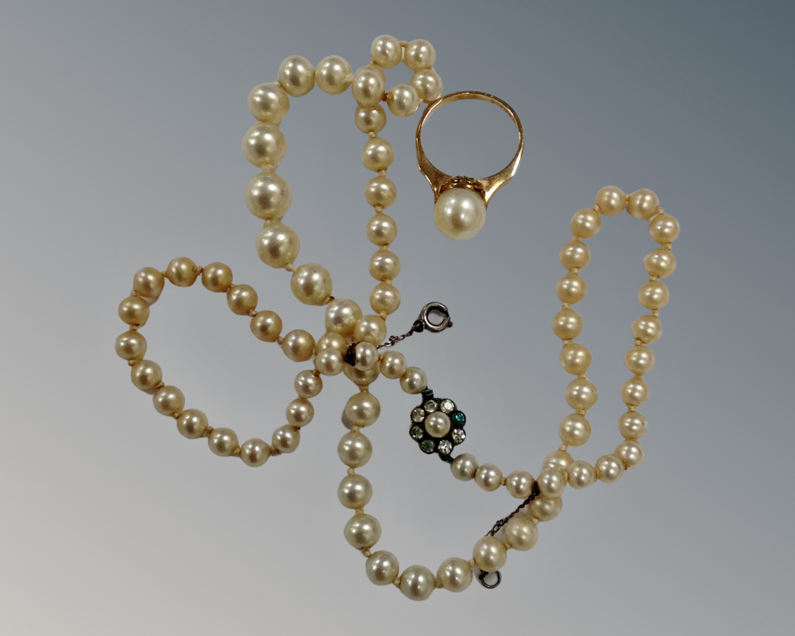 A 9ct yellow gold ring set with a pearl, size K, together with a Ciro necklace.