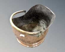 A 19th century hammed copper brass handled coal bucket