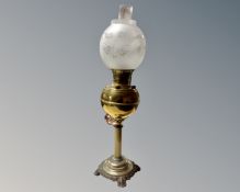 A Victorian Corinthian column oil lamp with opaque glass shade
