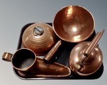 A tray of antique copper ware